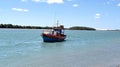 Lonely fishing boats anchored on the beach, sea fishing Royalty Free Stock Photo