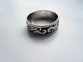 Silver ring on gray background Royalty Free Stock Photo