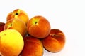 Seven juicy and ripe peaches on a white background