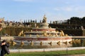 Beautiful side view to fountain with details in Versailles Castle in Paris, France, fountain, flowers and garden