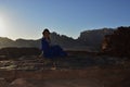 Girl at the sunset in the Wadi Rum desert in Jordan Royalty Free Stock Photo