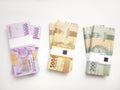 Flat Lay, Photo Simple Photo, Top View, Packs of Rupiah Indonesia Money, 2000, 5000, 10000, at white background