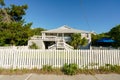 PHoto of a single family house with white picket fence in Wrightsville North Carolina close to the beach Royalty Free Stock Photo