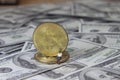 Conceptual Photo, sitting young businessman, doing bitcoin transaction, beyond dollar paper money, mini figure scale 1/87 or HO