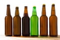 Photo of six different full beer bottles with no labels. Separate clipping path for each bottle included. six 6 separate photos