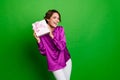 Photo of smiling beautiful young brown bob hair lady hold pink surprise package at birthday holiday isolated on green