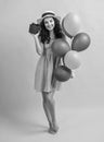 photo of smiling birthday woman with gift balloons. birthday woman with gift balloons