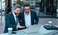 photo of smiling businessmen trading online. two businessmen trading online. Royalty Free Stock Photo