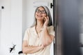 Photo of smiling gray-haired asian woman talking on mobile phone Royalty Free Stock Photo