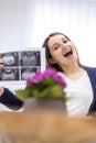 Photo of smiling pregnant woman holding ultrasound result. Royalty Free Stock Photo