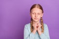 Photo of sneaky evil little girl hold fists look empty space planning wear blue shirt isolated violet color background