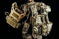 Soldier holding level 3 camouflaged armored vests