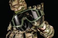 Soldier in level 3 armored vest ammunition holding tactical goggles