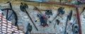 Photo of some medieval weapons and objects placed on a wall at the entrance of a small museum in the Rasnov Citadel - Rasnov,