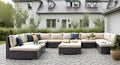 Ai generated a spacious outdoor living area with a comfortable sectional couch on a stone patio Royalty Free Stock Photo
