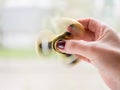 Photo of the spinner in the hand Royalty Free Stock Photo