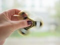 Photo of the spinner in the hand Royalty Free Stock Photo