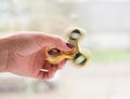 Photo of the spinner in the hand Royalty Free Stock Photo