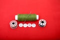 Photo of spool thread, needle, bobbin and button Royalty Free Stock Photo