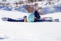 Photo of sporty woman with snowboard lying Royalty Free Stock Photo