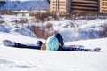 Photo of sporty woman with snowboard lying Royalty Free Stock Photo