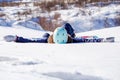 Photo of sporty woman with snowboard lying Royalty Free Stock Photo