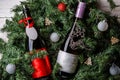 Photo of spruce branches with two bottles of wine, blank greeting card Royalty Free Stock Photo