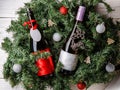 Photo of spruce branches with two bottles of wine, blank greeting card Royalty Free Stock Photo