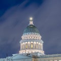 Photo Square frame Facade of majestic Utah State Capital Building glowing against sky and clouds Royalty Free Stock Photo