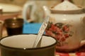 Photo of stainless steel teaspoon in a mug