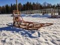 Photo of standalone wooden dog sled for dog sledding. Typical traditional old construction for winter racing in Lapland, Sweden Royalty Free Stock Photo