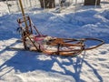 Photo of standalone wooden dog sled for dog sledding. Typical traditional old construction for winter racing in Lapland, Sweden Royalty Free Stock Photo