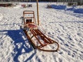 Photo of standalone wooden dog sled for dog sledding. Typical traditional old construction for winter racing in Lapland, Sweden Royalty Free Stock Photo