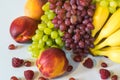 Photo of the still life with juicy, appetizing, bright fruits on a light background