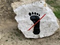 Photo of stone with don`t touch sign, Gobustan Azerbaijan