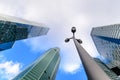 Photo of Streetlight or street lamp with blurred skyscrapers in background. Business center of the Moscow city concept