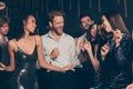 Photo of students company celebrating prom party in night club dancing laughing together wearing fashionable festive Royalty Free Stock Photo