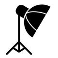 Photo studio equipment solid icon. Umbrella on tripod vector illustration isolated on white. Photo umbrella glyph style Royalty Free Stock Photo