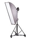 Photo studio lighting stands with flash and softbox isolated on the white Royalty Free Stock Photo