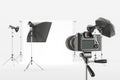 Photo studio professional equipment, camera and cyclorama with lighting
