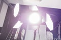 Photo studio with professional lighting equipment.
