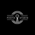 Photo studio vintage retro emblem. White linear photographer logo concept on black background. Vector illustration.