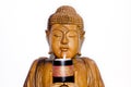 Photo studio of a wooden Buddha carvin