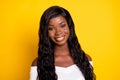 Photo of stunning afro american pretty woman good moon nice smile isolated on shine yellow color background Royalty Free Stock Photo