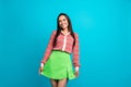 Photo of stunning lady posing demonstrating store clothes wearing fabric blouse short skirt isolated teal blue color Royalty Free Stock Photo