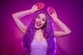 Photo of stunning minni mouse role play girly lady with long lilac purple wig curls hold two donuts like ears have fun