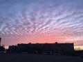 Photo of sunrise with red pile clouds