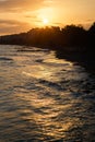 Photo of sunset,coastal marine area