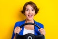 Photo of surprised business lady impressed fast speed quality service rent car isolated on bright color background