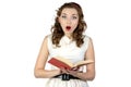 Photo of surprised pinup woman reading book